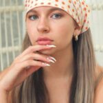 Tips - Woman Sitting in a Hanging Armchair