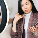 Tips - Vlogger Applying Makeup and Live Streaming with her Phone