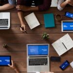 Ideas - Top View Photo Of People Near Wooden Table