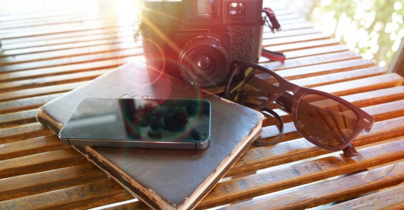 Items - Black Film Camera on Table