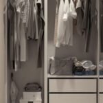 Wardrobe - Assorted Clothes Hanged Inside Cabinet