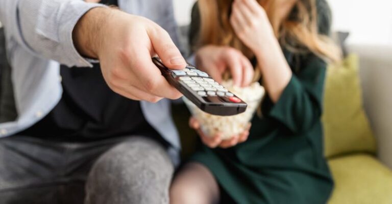 TV - Man Holding Remote Control