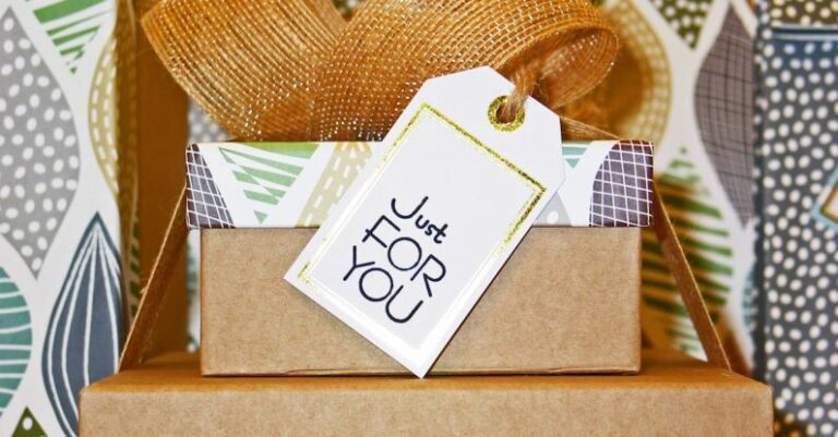 Gifts - Close-up Photo of Gift Boxes with Greeting Card